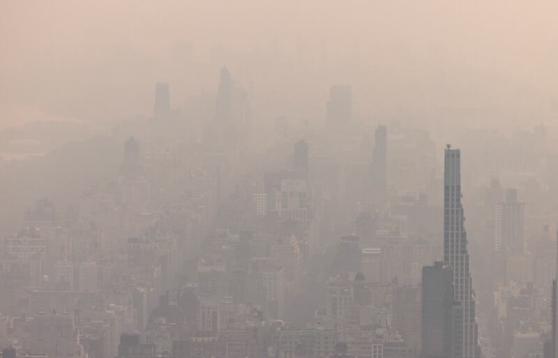 Haze caused by smoke from wildfires burning in Canada hangs over Manhattan on Wednesday. Photograph: Justin Lane/EPA-EFE