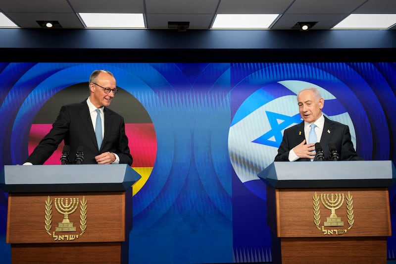 Israeli prime minister Binjamin Netanyahu (R) and German chancellor Friedrich Merz speak to the media during a joint press conference in Jerusalem on Sunday. Photograph: Ariel Schalit/AFP/Getty Images