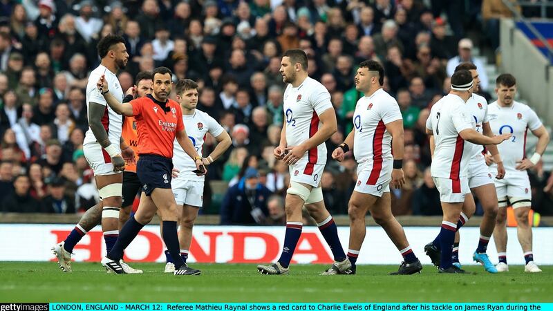 Referee Mathieu Raynal shows a red card to Charlie Ewels of England after his high tackle on James Ryan. Photograph: David Rogers/Getty Images