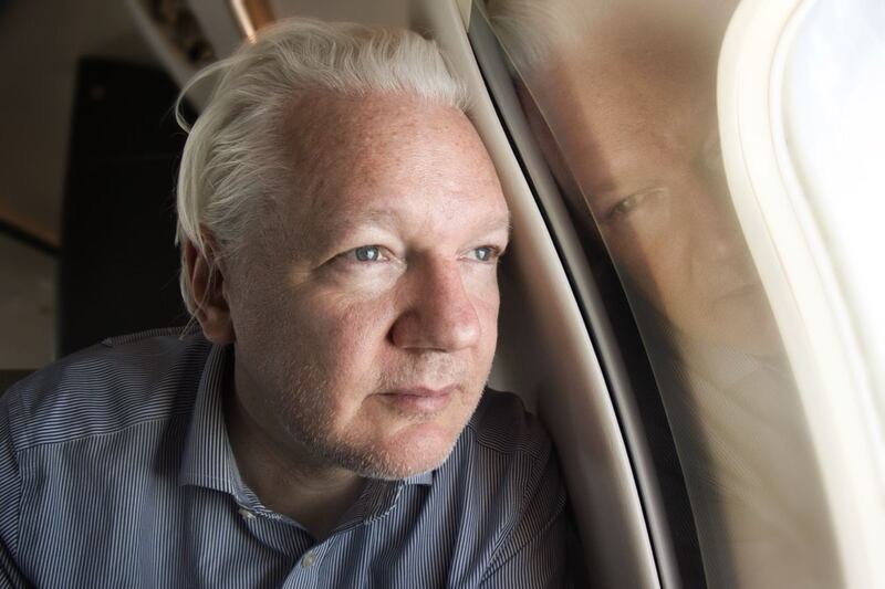 Julian Assange on board a flight to Bangkok after his release from prison in the UK.  Photograph: @WikiLeaks/PA Wire