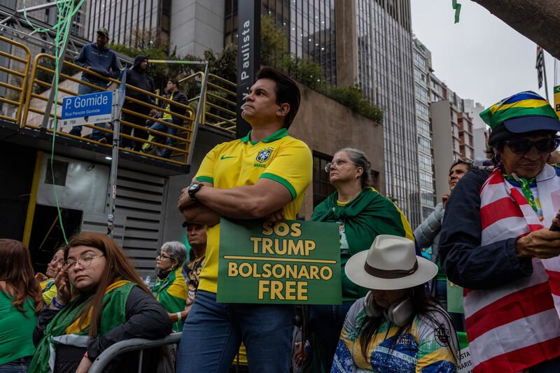 A Trump and Bolsonaro supporter during a demonstration in São Paulo, Brazil, on Sunday. Photograph: Victor Moriyama/New York Times
                      