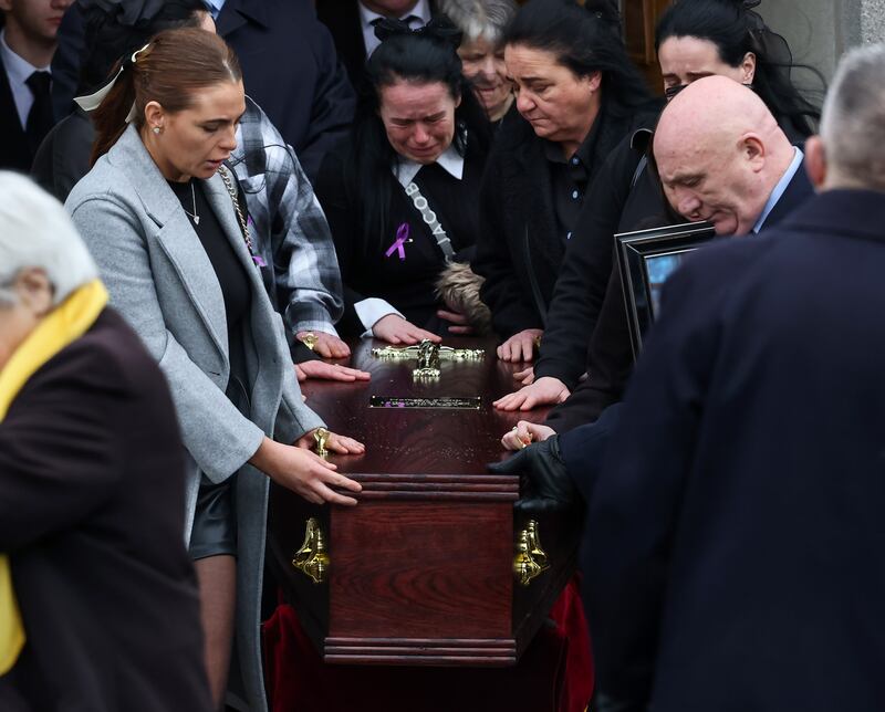 Mourners stand around Smith's coffin outside the church on Friday. Photograph: Colin Keegan/Collins