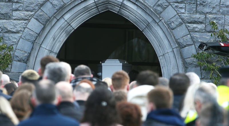 Katie Graham's coffin being taken into the church. Photograph: Stephen Collins/Collins Photos
