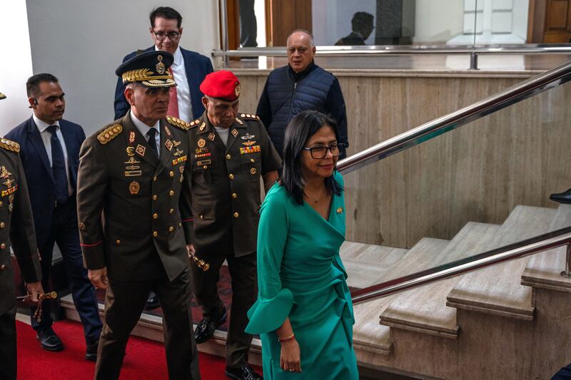 Delcy Rodríguez (right) of Venezuela arrives to be sworn in as the country's interim leader in Caracas on Monday. Photograph: Alejandro Cegarra/The New York Times
                      