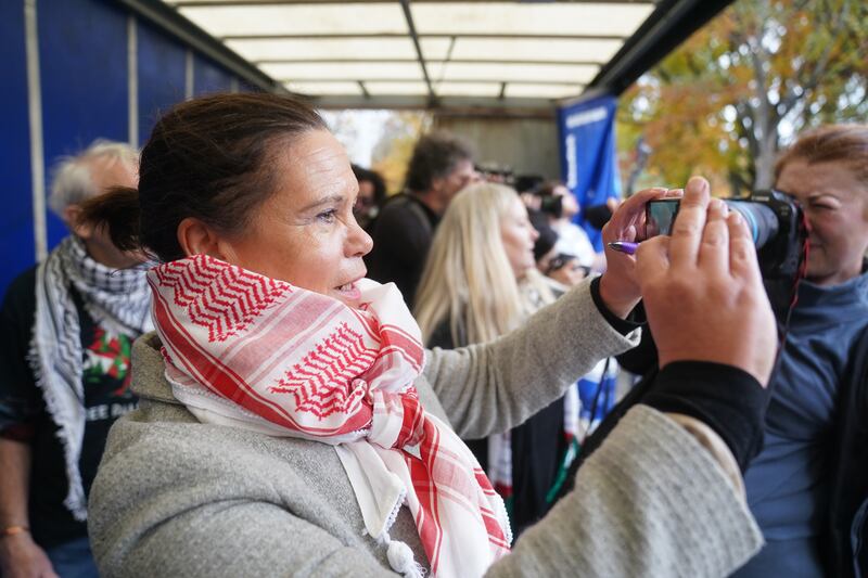 Sinn Fein leader Mary Lou McDonald takes a picture of protesters during the pro-Palestine rally. Photograph: Brian Lawless/PA Wire 