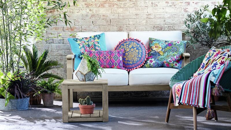 Embroidery on brightly coloured cushions gives an additional sense of texture as these four designs from Marks & Spencer demonstrate