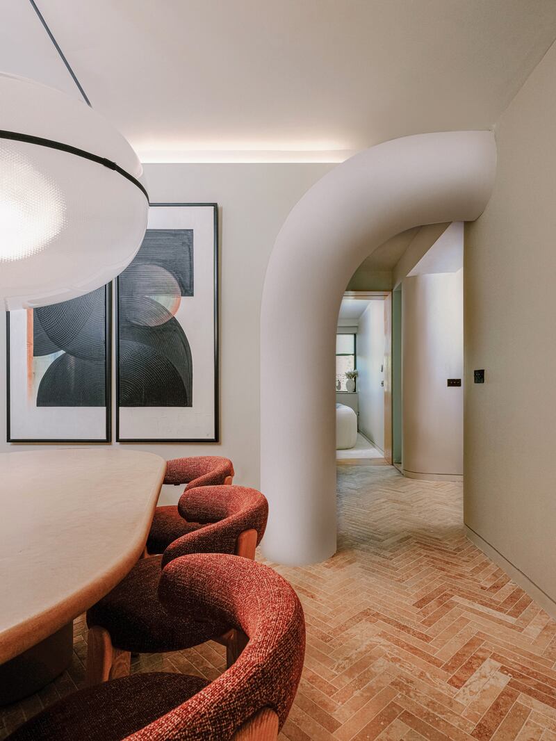 Dining area of the open-plan space looking towards the inner entrance hall. Photograph Max Fedorov