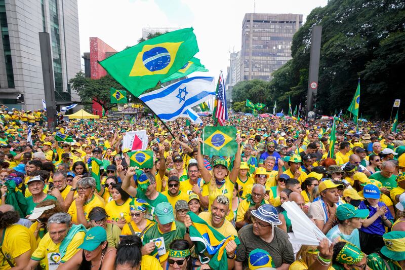 Followers of Jair Bolsonaro rally to express their support for him. Photograph: Andre Penner/AP