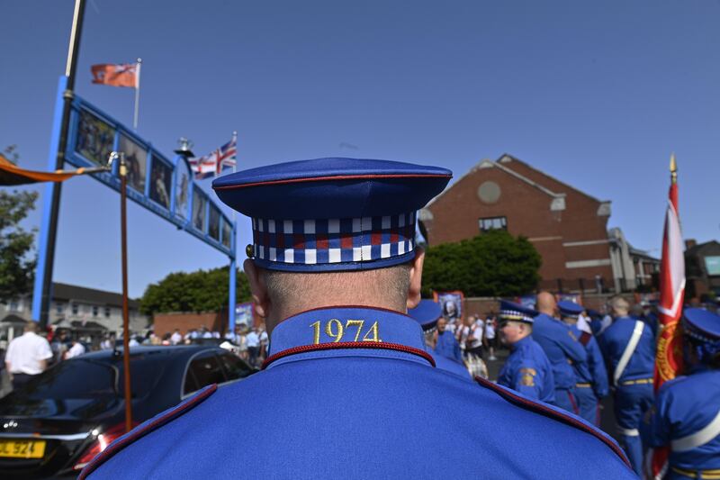 Band members and members of the Orange Order prepare to parade on the streets in Belfast. Photo: EPA/Shutterstock