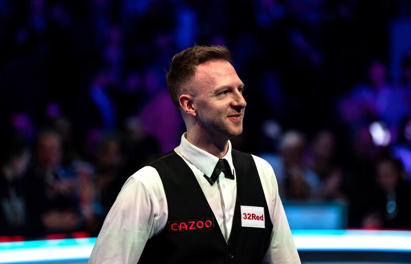 Judd Trump celebrates winning his match against Stuart Bingham. Photograph: Steven Paston