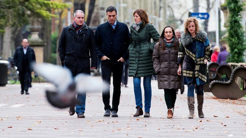 Spanish Socialist Party (PSOE) leader and candidate for prime minister Pedro Sanchez (second left), with party members Javier Lasarte (left), Idoia Mendia (third right), Julia Liberal (second right) and Cristina Gonzalez. Photograph: Adrian Ruiz de Hierro/EPA