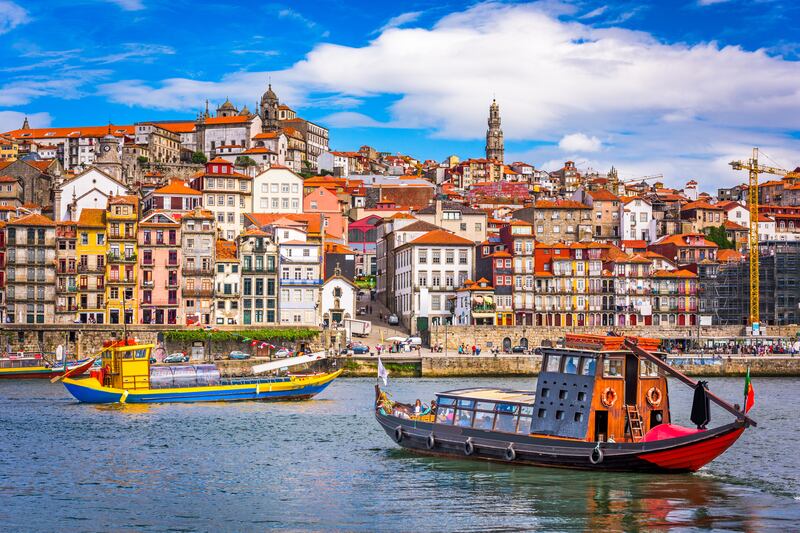 The old town of Porto, in Portugal, across the Douro River: Consider the Passe Ferroviário Nacional, or National Train Pass, for getting around. Photograph: iStock