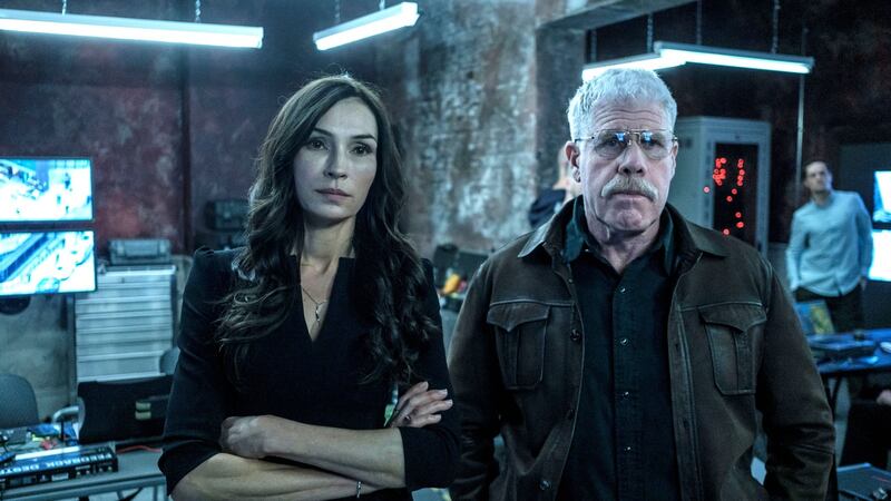 Famke Janssen and Ron Perlman in The Capture