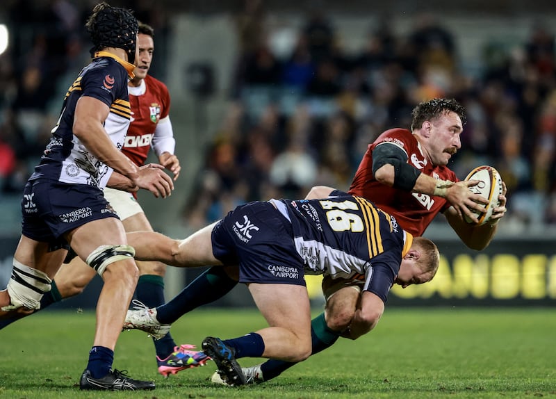 The Lions’ Jack Conan is tackled by Liam Bowron of the Brumbies. Photograph: Dan Sheridan/Inpho