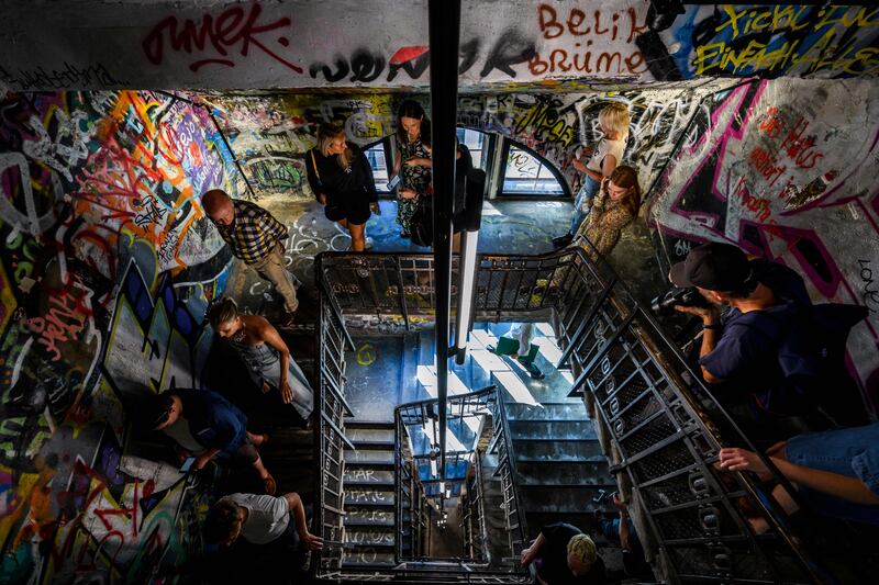 The familiar graffitied stairwell is still there but the bite of urine in the air is missing, writes Derek Scally. Photograph: John MacDougall/Getty