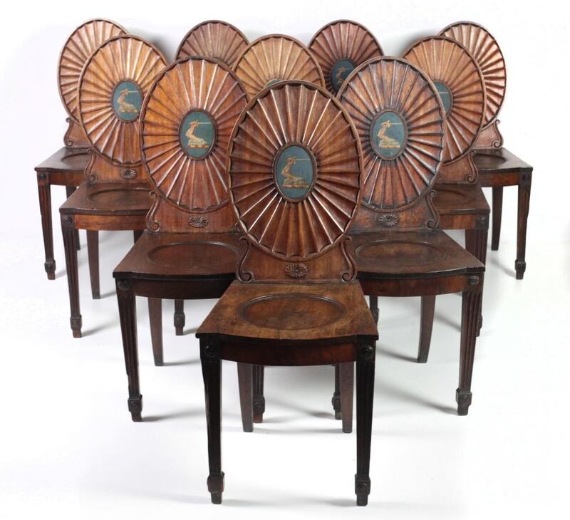Lot 438: the 10 crested hall chairs from Dromoland Castle