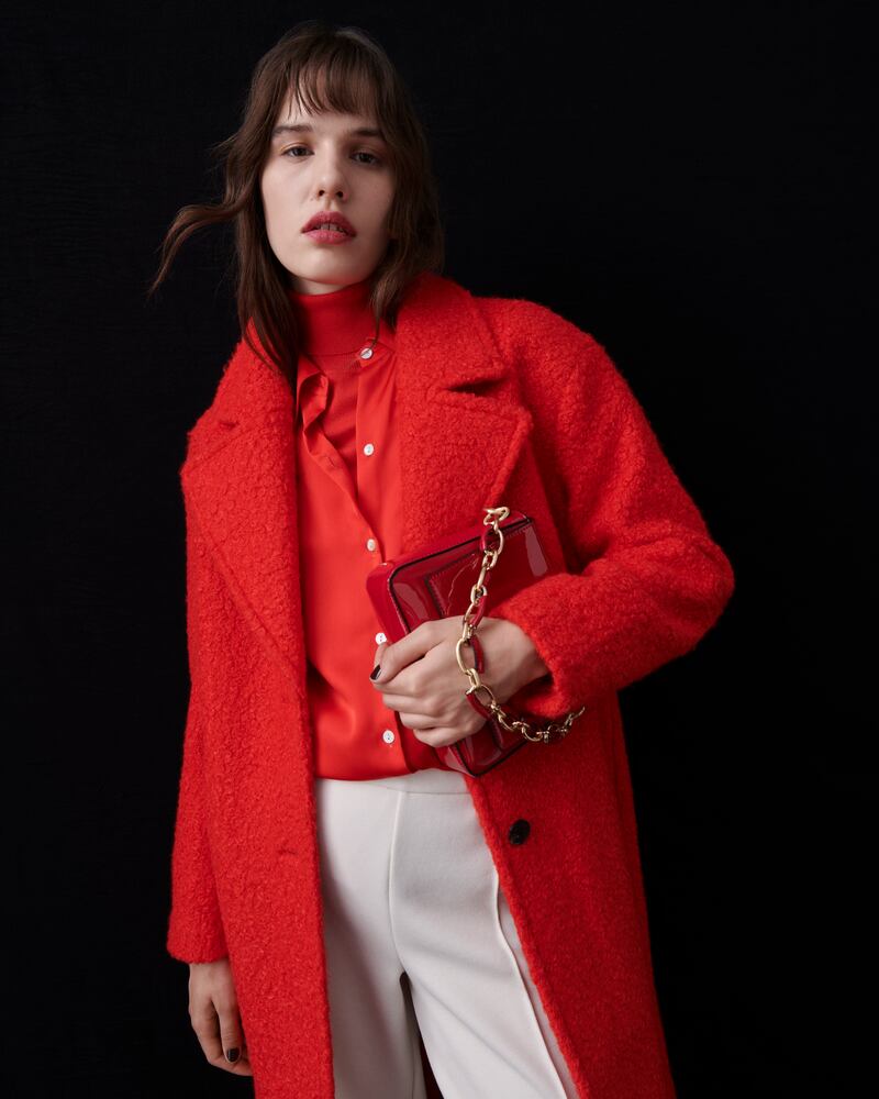 Red coat, €110, red shirt, €40, polo jumper, €28, white trousers, €50, patent bag, €54, all from the M&S Collection