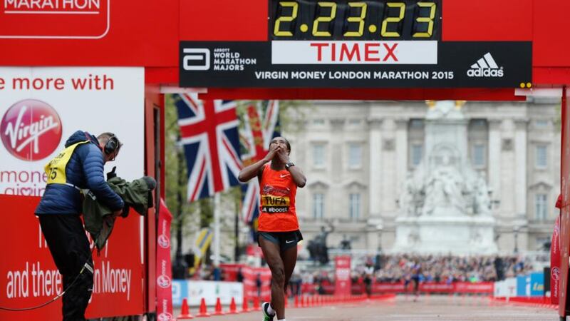 Ethiopia’s Tigist Tufa celebrates after winning the women’s elite race at the   London Marathon. Photo: Suzanne Plunkett/Reuters/Livepic