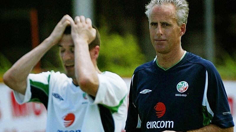 Roy Keane and Mick McCarthy during a practice game  in Saipan on  May 23rd, 2002.  Photograph: Kieran Doherty/Reuters