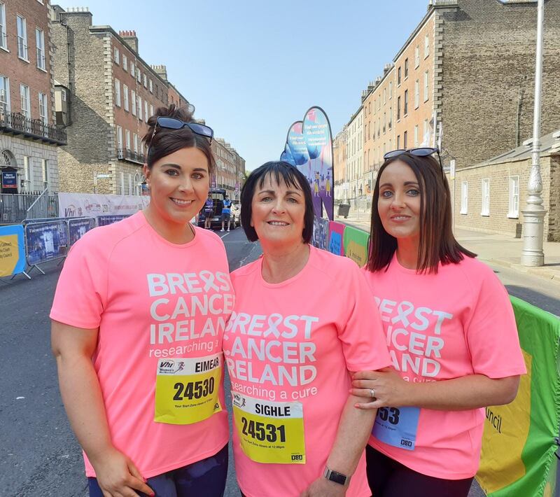 Sighle O'Toole with two of her daughters  Eimear Ryan and Aoife Munnelly taking part in the VHI Women's Mini Marathon. Photograph: Conor Capplis