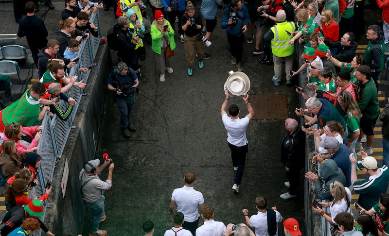 Mayo captain Jack Coyne carries the Sam Maguire Cup into MacHale Park, Castlebar, Co Mayo for last Monday's homecoming. Photograph: James Crombie/Inpho