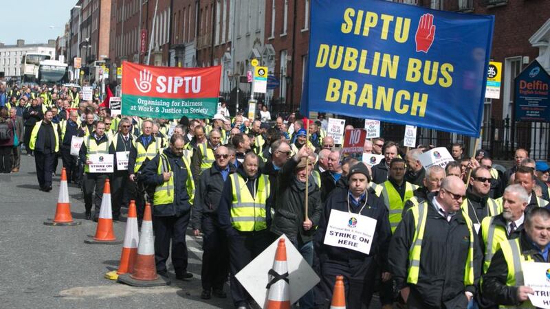 Members of the NBRU and  Siptu unions during a march in Dublin city centre coinciding with a strike over plans to put 10 per cent of public bus routes out to private tender. Photograph: Gareth Chaney/Collins