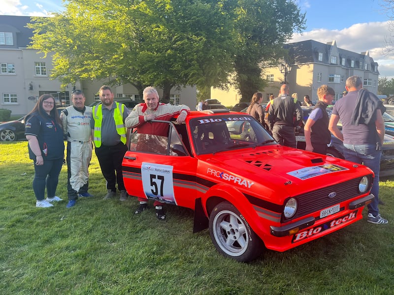 Saoirse Redmond, Seán Moriarty, Damien Price and Thomas Randles, standing alongside Mr Randles's Ford Escort after the races on Sunday