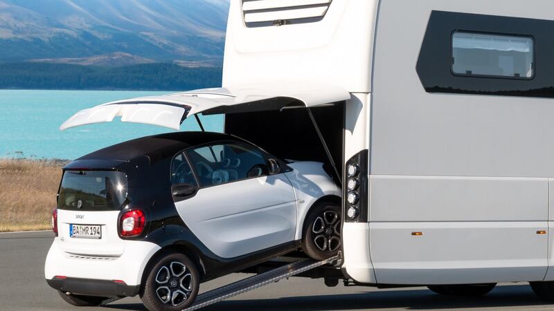 The Morelo Palace motorhome includes an integral garage that will happily accommodate another small vehicle for more versatile zipping around town.