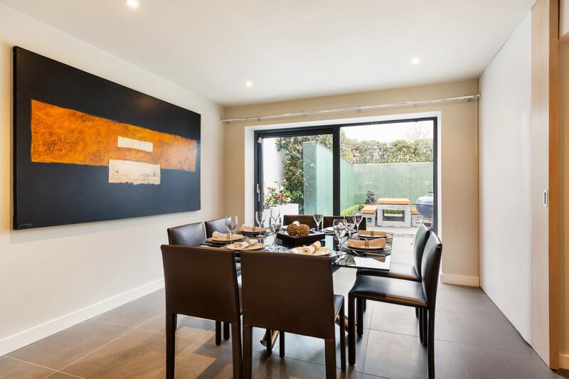The dining room opens out to the rear garden