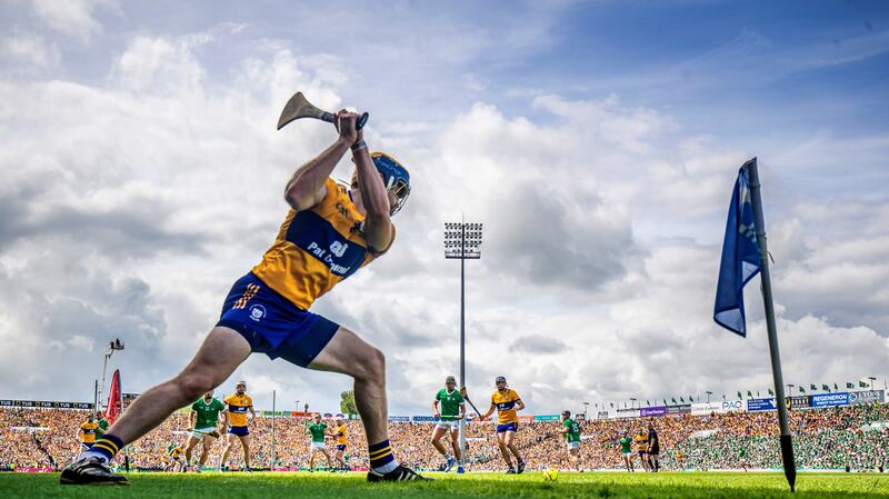 Clare’s John Conlan takes a sideline cut during the Munster SHC Final against Limerick at the TUS Gaelic Grounds. Photograph: Evan Treacy/Inpho