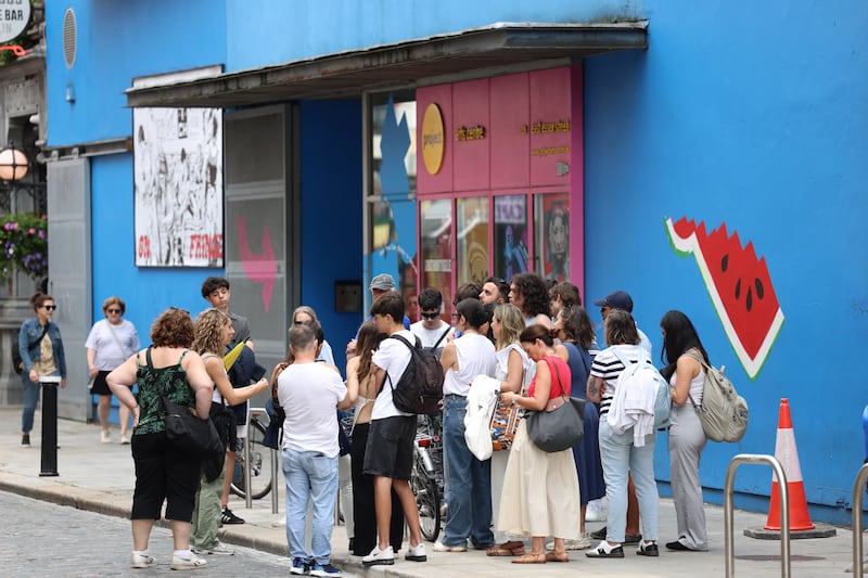 Visitors outside Project Arts Centre in Temple Bar. Photograph: Dara Mac Dónaill