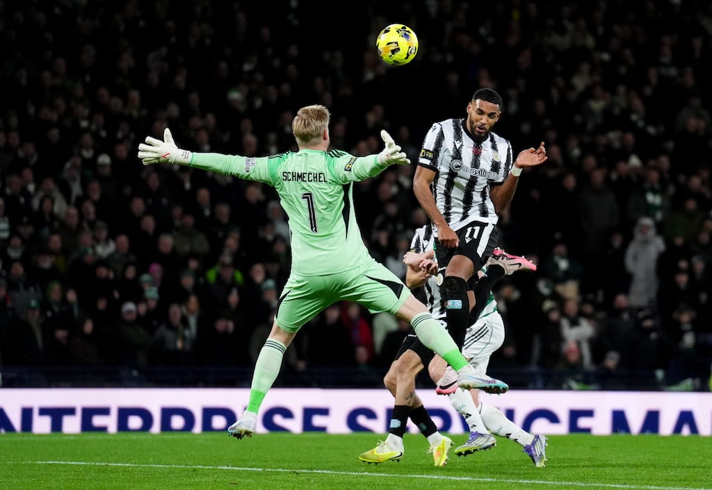 Jonah Ayunga heads St Mirren's second goal past Celtic goalkeeper Kasper Schmeichel. Photograph: Andrew Milligan/PA