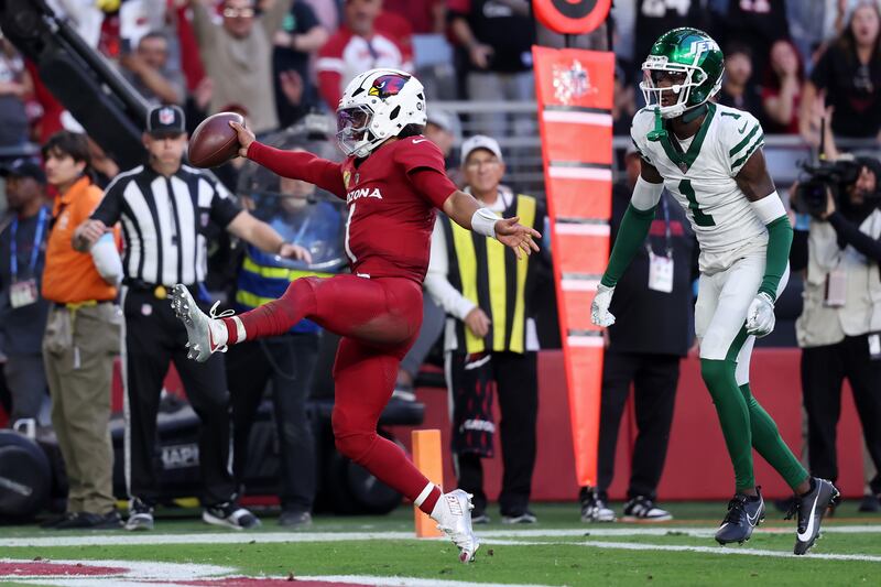 Kyler Murray of the Arizona Cardinals scores a touchdown past Sauce Gardner of the New York Jets. Photograph: Chris Coduto/Getty Images