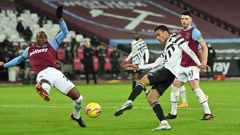 Manchester United’s Mason Greenwood scores his side’s second goal  during the Premier League match against West Ham at The London Stadium. Photograph: Justin Setterfield/PA Wire