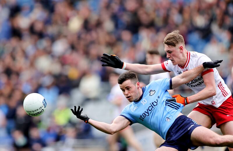 Dublin's Ross McGarry and Lorcan McGarrity of Tyrone. Photograph: Tom Maher/Inpho