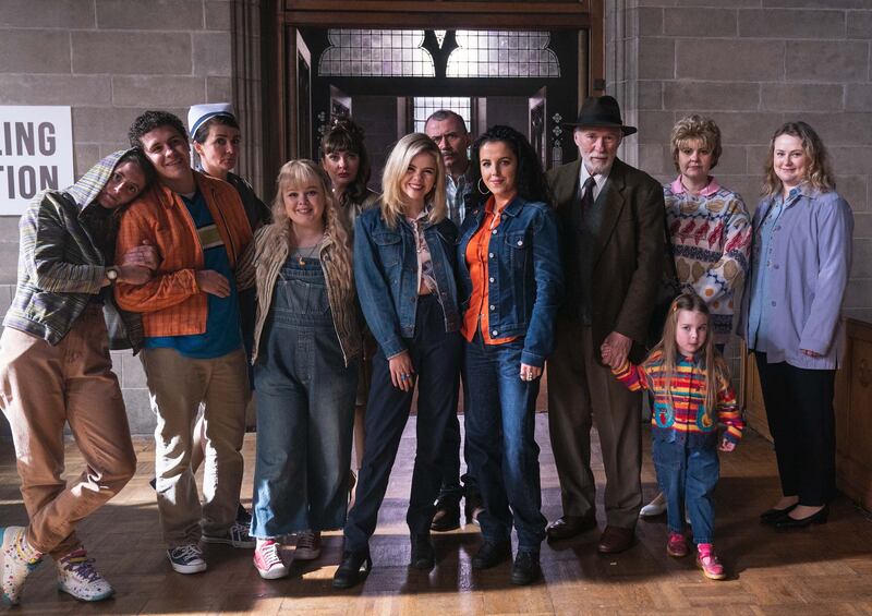 Ian McElhinney, third from right, with the cast members of Derry Girls. The hit Channel 4 comedy series came to an end in 2022. Photograph: Peter Marley/Channel 4