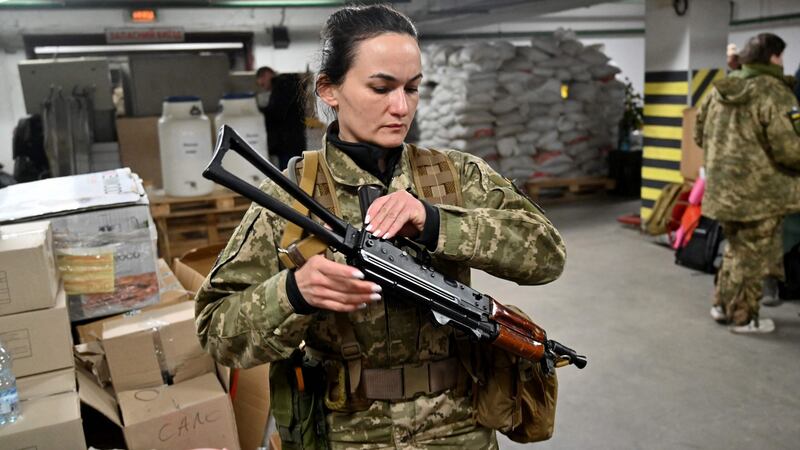 Iryna Sergeyeva, Ukraine’s first female volunteer fighter to get a full military contract with the Territorial Defence Forces, attends training in an underground garage in Kyiv. Photograph: Sergei Supinsky