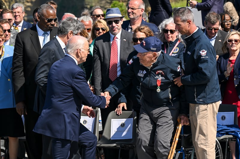 US president Joe Biden greets second World War veterans during D-Day commemorations at the Pointe du Hoc Ranger Monument in Normandy, France, on June 7th. Photograph: Kenny Holston/New York Times