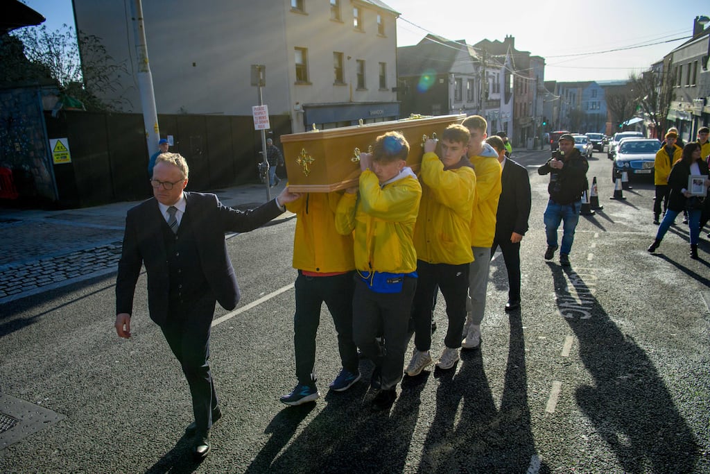 Volunteers for the Cork housing charity SHARE fulfil the dying wish of Kenyon Jones “Taffy” Ginn by shouldering his coffin on Shandon Street in Cork City.
Photograph: Daragh Mc Sweeney/Provision