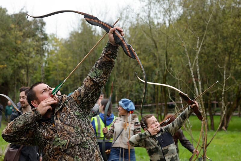 Keith and Charlie Ryan from Galtee Archery participating in the All Ireland Archery Festival 2023 at Fior Bhia Farm in Portlaoise. Photograph: Alan Betson

