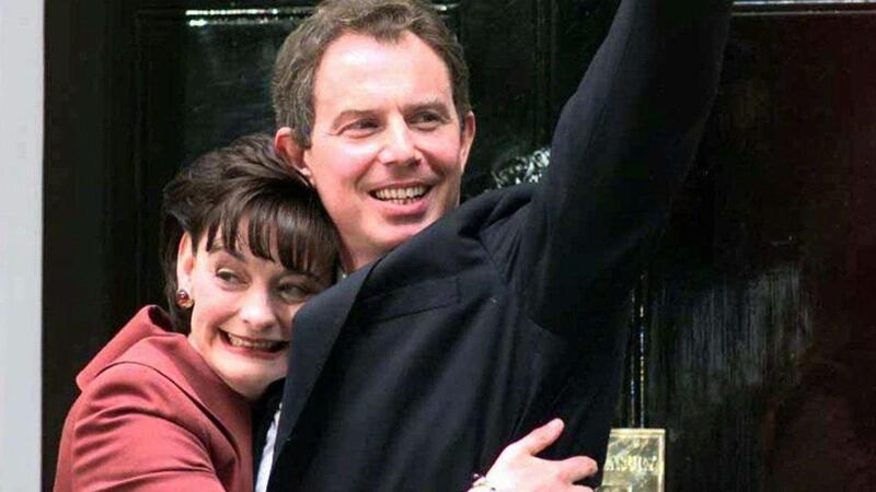 Tony Blair waves outside 10 Downing Street, London, as he is embraced by his wife, Cherie,  after his election as prime minister in 1997. Photograph:Max Nash/AP Photo/FILE/