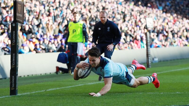 Sean Maitland dives to score Scotland’s first try at Murrayfield. Photograph: David Rogers/Getty