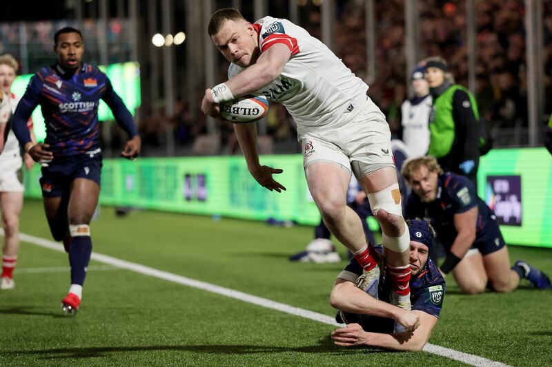 Ulster's Zac Ward is tackled by Edinburgh's Liam McConnell. Photograph: Laszlo Geczo/Inpho