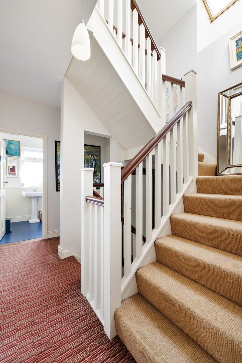 Landing with stairs to attic