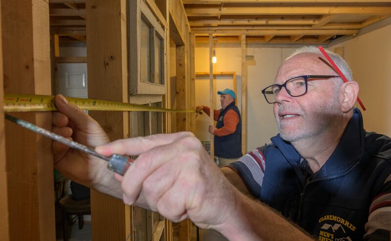 Joe Cosgrove and Damien Roche measure up while working on a project at Claremorris Men’s Shed.