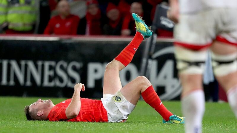 Munster’s JJ Hanrahan goes down with an injury during the Guinness Pro 14 game against  Ulster at  Thomond Park. Photograph: Dan Sheridan/Inpho