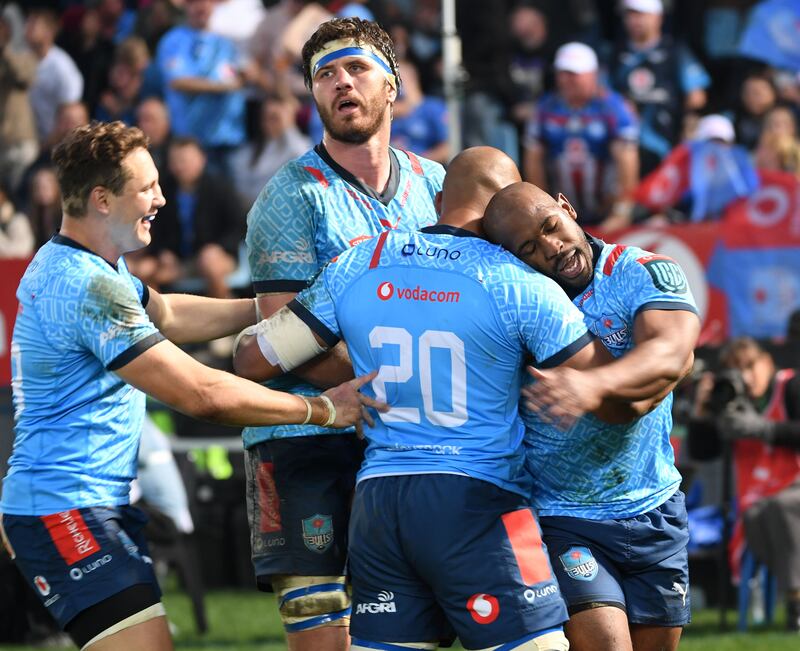 Nizaam Carr, Ruan Nortje and Sergeal Petersen of the Bulls celebrate the victory over Leinster at Loftus Versfeld in Pretoria, South Africa. Photograph: Lee Warren/Gallo Images/Getty Images