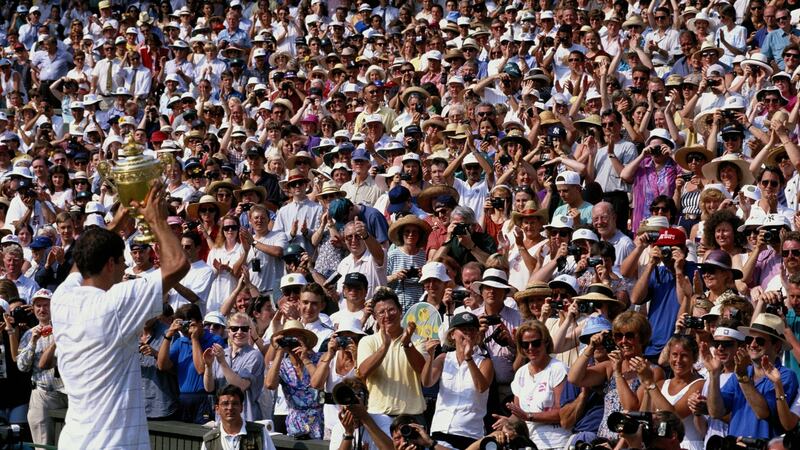 Pete Sampras celebrates after beating Boris Becker in the 1995 Wimbledon final. Photograph: Clive Brunskill/Allsport