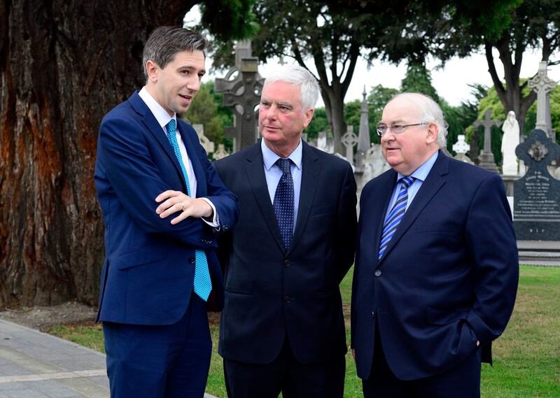 Minister for Health Simon Harris, Stephen Collins at Glasnevin Cemetery with Senator Paul Collins in 2017. Photograph: Cyril Byrne