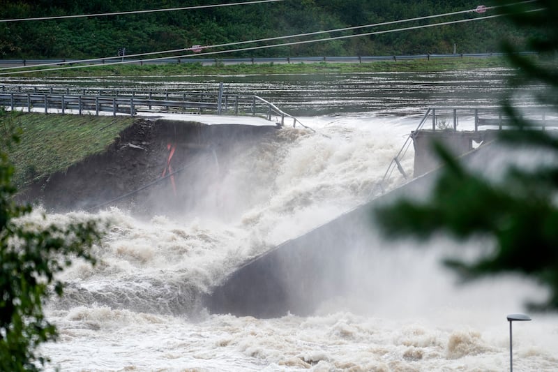 A dam partially burst following days of heavy rain resulting in communities downstream to be evacuated. Photograph: Cornelius Poppe/NTB Scanpix/AP